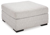 Koralynn Stone 3-Piece Sectional with Ottoman — angled view