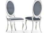 Black velvet oval dining chair with gold base angled