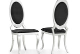 Four D832 oval velvet dining chairs grouped around dining table