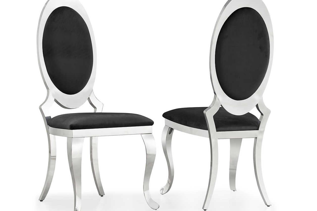 Four D832 oval velvet dining chairs grouped around dining table