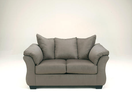 Attached cushions on recliner seat and back
