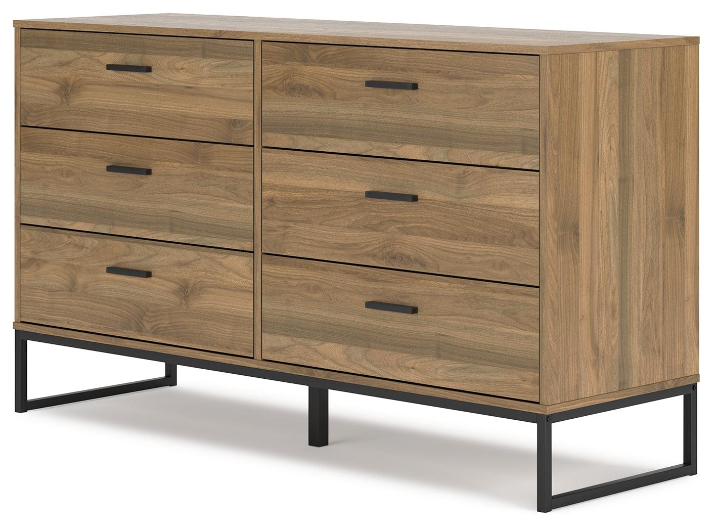 Close-up of metal legs on Deanlow Honey dresser
