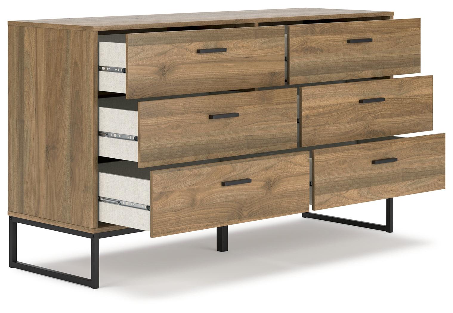 Open drawer of Deanlow Honey dresser showing vinyl-wrapped sides