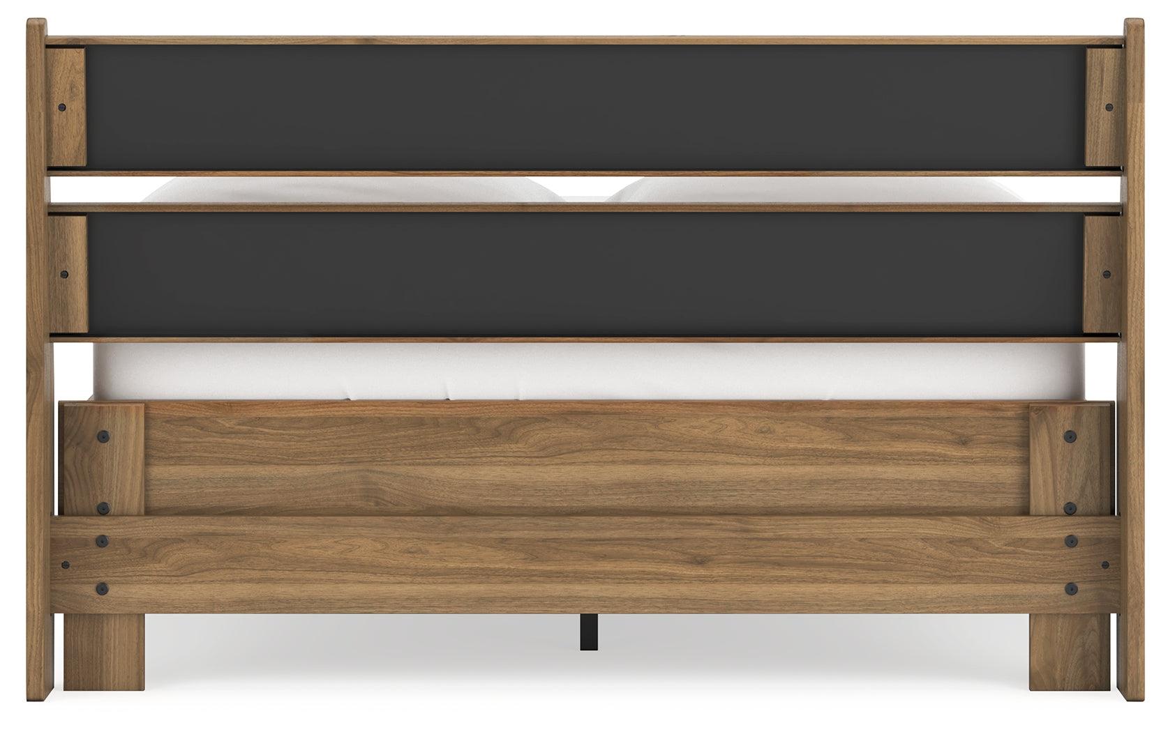 Panel bed corner detail in honey finish