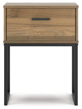 Close-up of walnut grain decorative laminate on nightstand