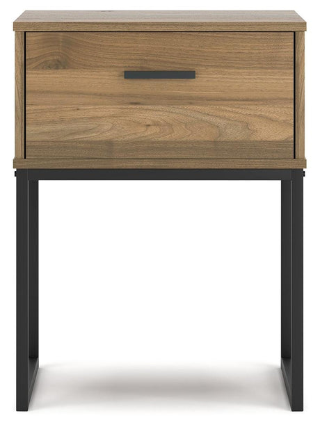 Close-up of walnut grain decorative laminate on nightstand
