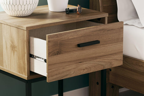 Deanlow Nightstand full view in styled bedroom setting