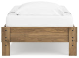 Front view showcasing platform bed’s minimalist design