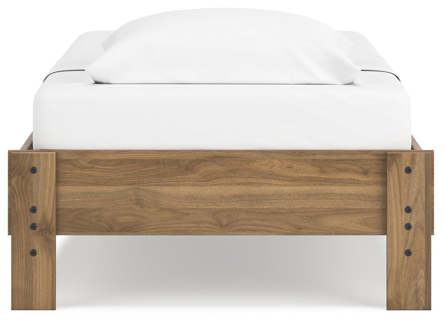Front view showcasing platform bed’s minimalist design