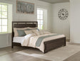 Covetown Dark Brown Panel Bedroom Set King 3: Bed, Dresser, Mirror from Decor Furniture