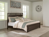 Covetown Dark Brown Panel Bedroom Set King 3: Bed, Dresser, Mirror from Decor Furniture