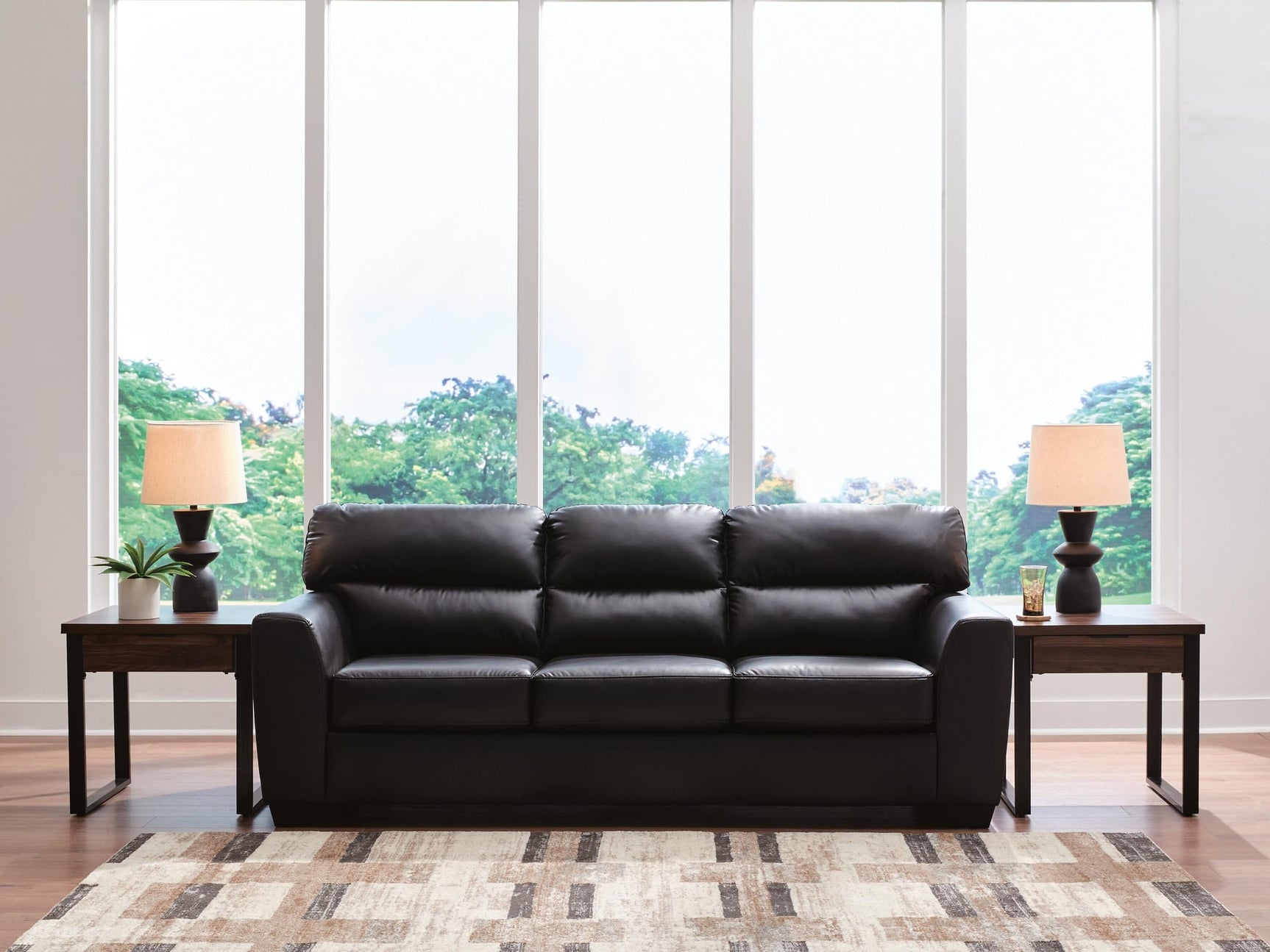 Glennbre Midnight Faux Leather Sofa from Decor Furniture