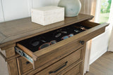 Karallin Medium Brown Chest of Drawers detail view
