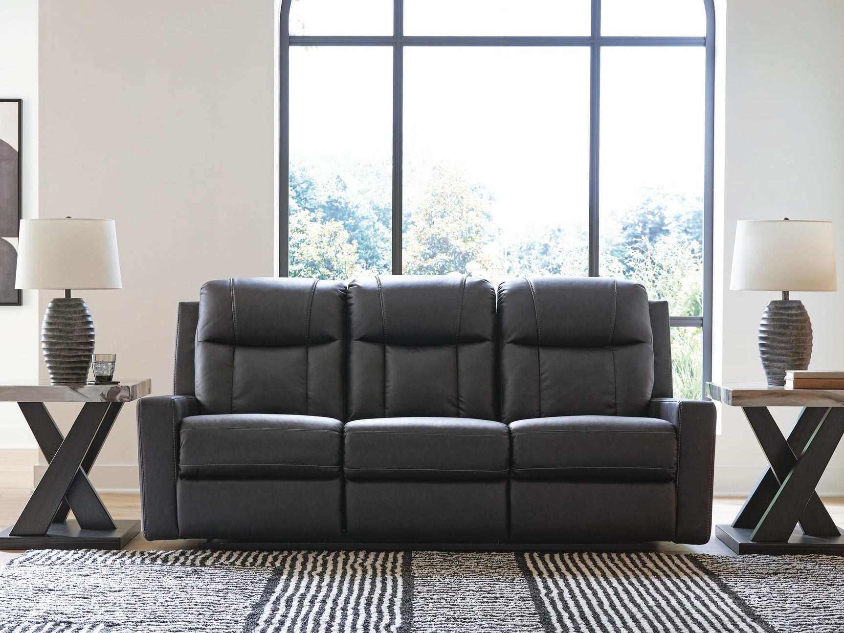 Mackmenville Carbon Faux Leather Reclining Sofa view 6