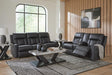Mackmenville Carbon Reclining Sofa and Reclining Loveseat with Console from Decor Furniture