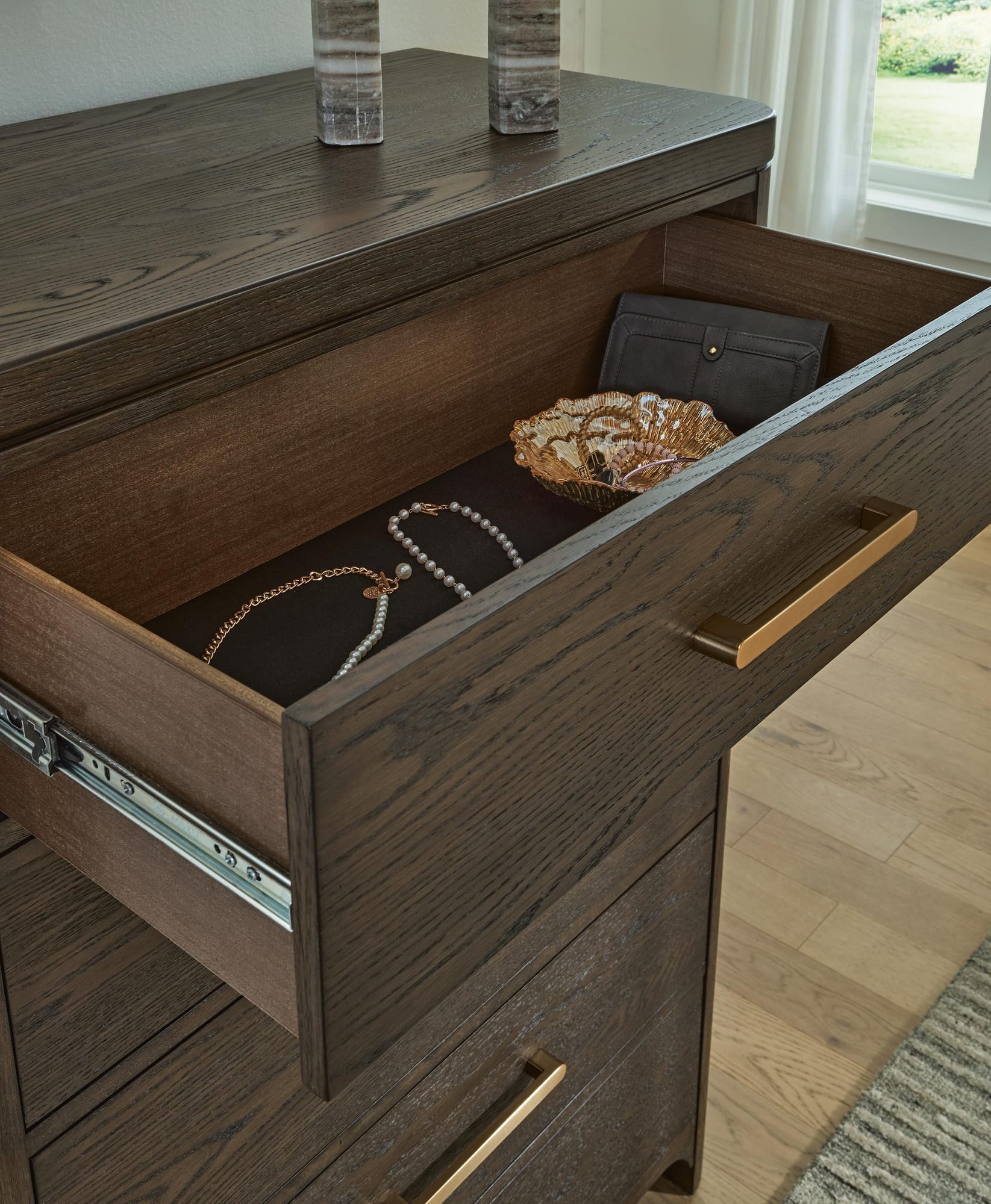 Radkin Burnished Brown Chest of Drawers detail view