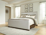Radkin Burnished Brown King Upholstered Panel Bed from Decor Furniture