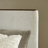 Radkin Burnished Brown Queen Upholstered Panel Bed detail view