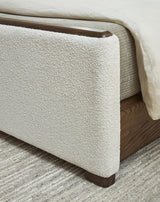 Radkin Burnished Brown Queen Upholstered Panel Bed detail view
