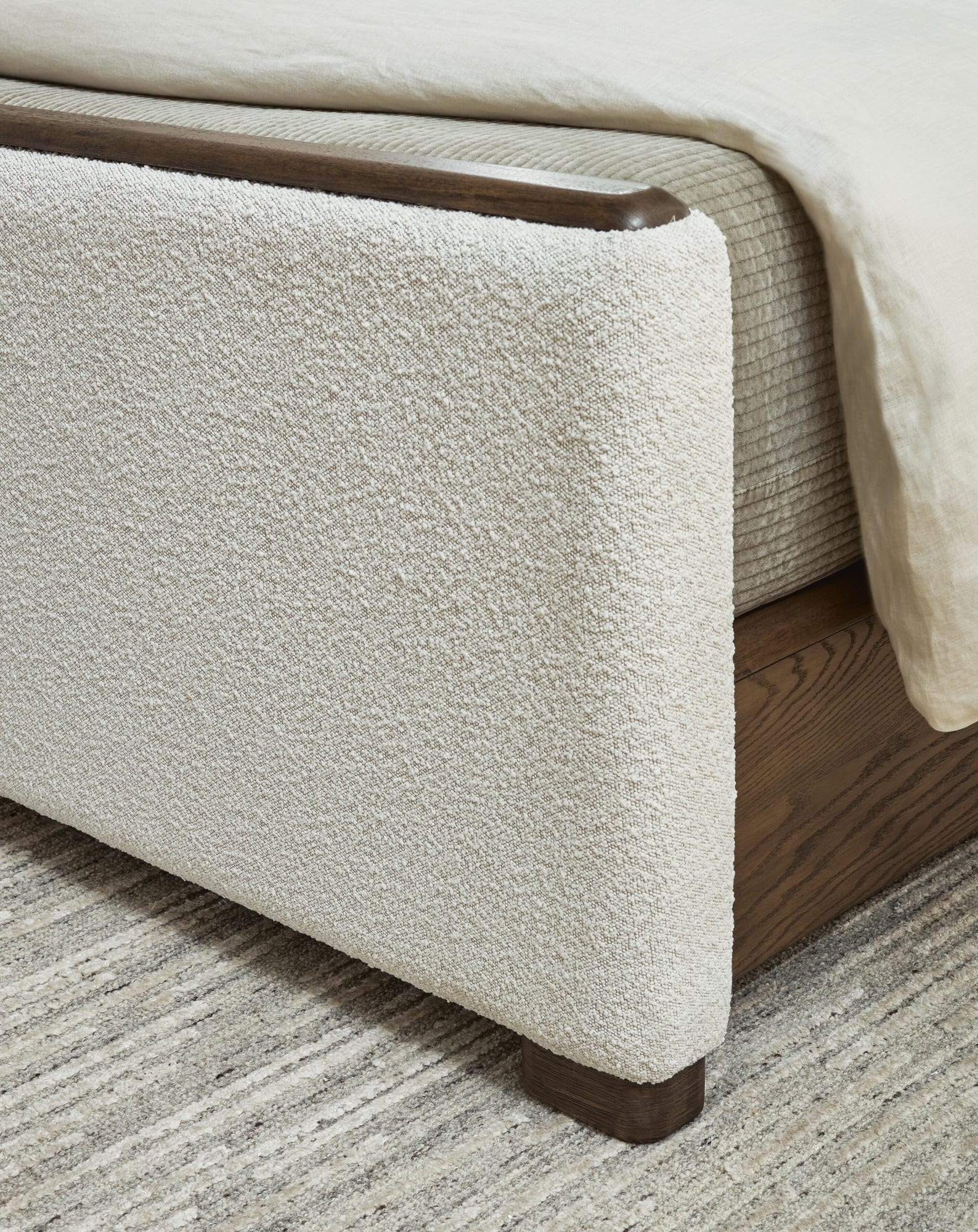 Radkin Burnished Brown Queen Upholstered Panel Bed detail view