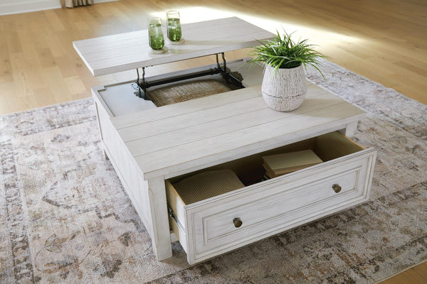 Robbinsdale Antique White Lift-Top Coffee Table from Decor Furniture