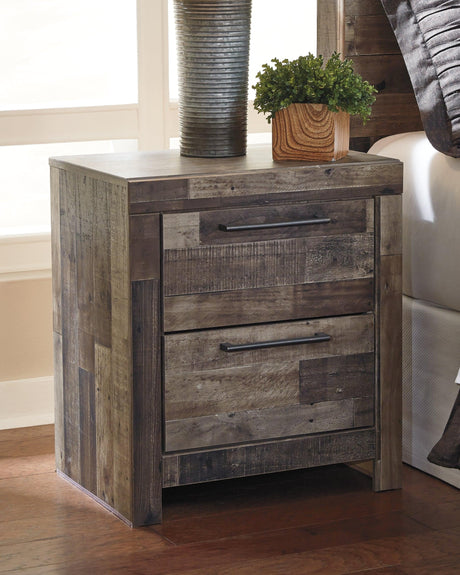 Bedroom setting featuring Derekson Multi Gray Panel Bedroom Set