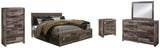 Side angle of Derekson Multi Gray Panel Storage Bedroom Set bed