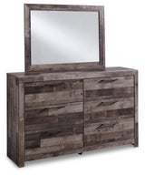 Bedroom view of Derekson Multi Gray Panel 6 Storage Bedroom Set bed