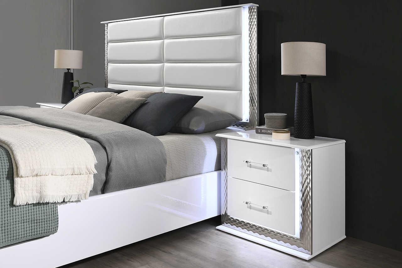 Side view of Dina White LED Upholstered Storage Platform Bedroom Set bed
