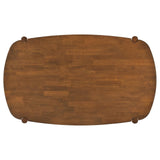 Oval solid wood dining table walnut finish from above angle