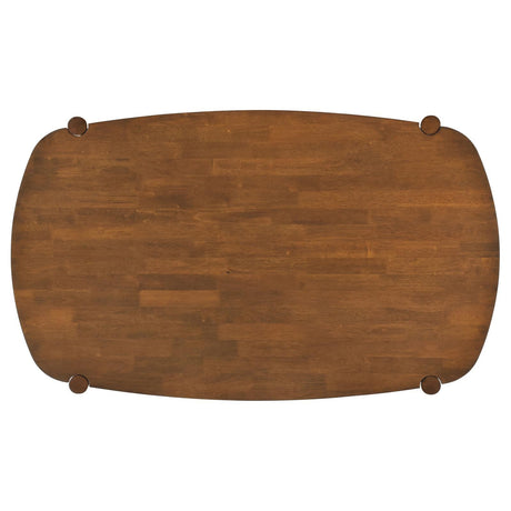 Oval solid wood dining table walnut finish from above angle
