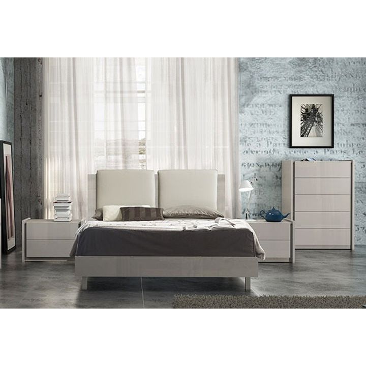 Nightstand styled with bedroom decor in sage gray