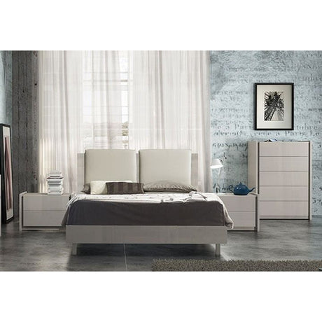 Nightstand styled with bedroom decor in sage gray