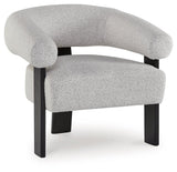 Side view of Dultish Snow Accent Chair highlighting cutout detail