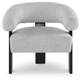 Close-up of textured snow-colored polyester upholstery on accent chair