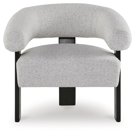 Close-up of textured snow-colored polyester upholstery on accent chair
