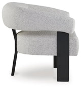 Detail of matte black three-leg wood frame on Dultish chair