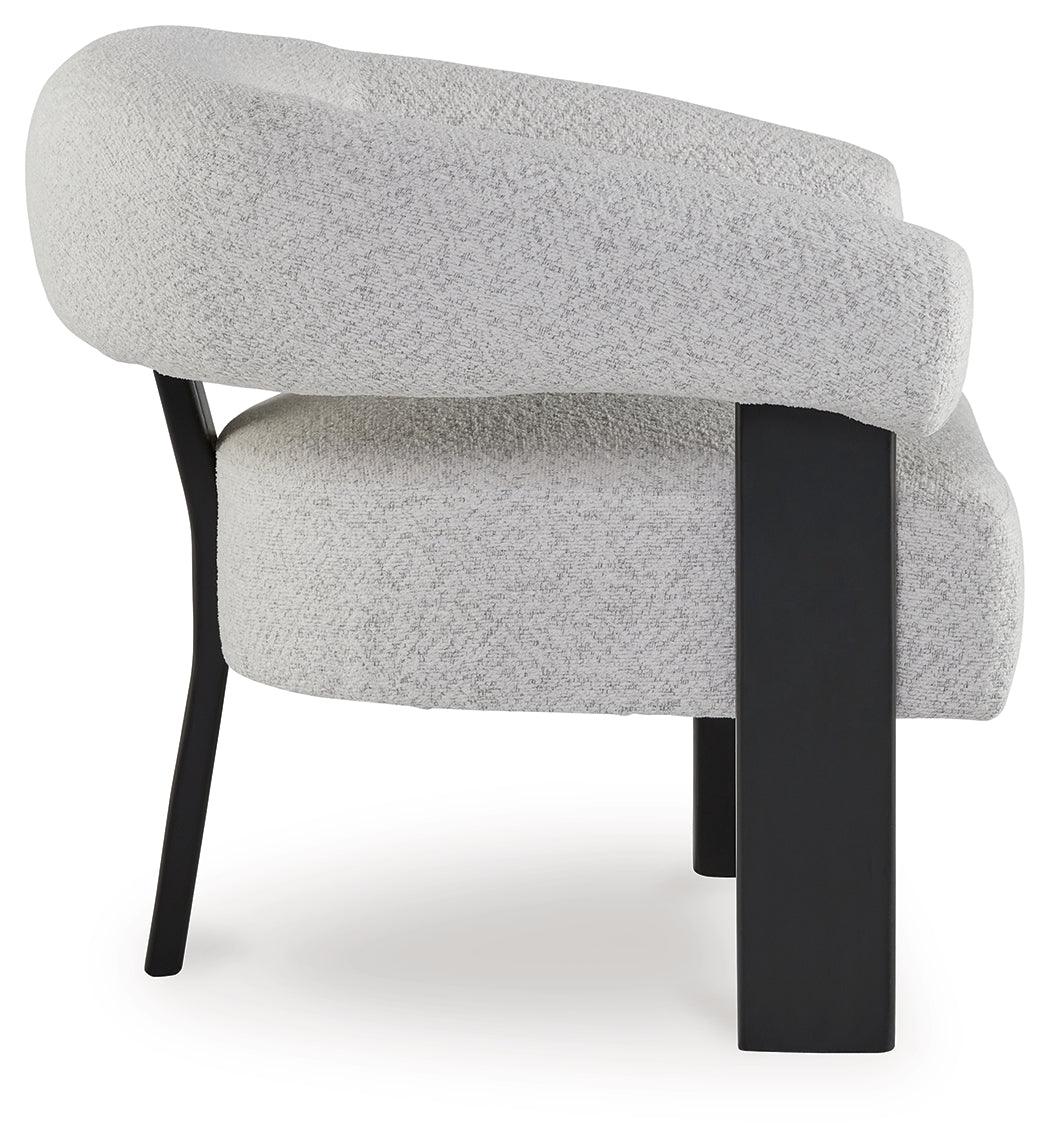 Detail of matte black three-leg wood frame on Dultish chair