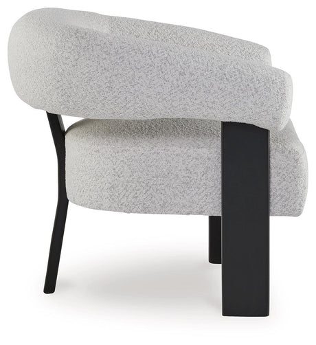 Detail of matte black three-leg wood frame on Dultish chair
