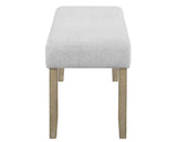 Top angle showcasing beige gray fabric upholstered dining table and chairs