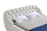 Bubbles King Bed angled view with bedding
