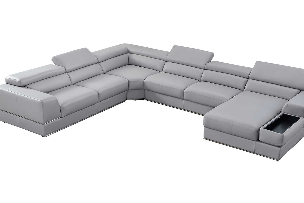 Side profile of light gray leather sectional sofa