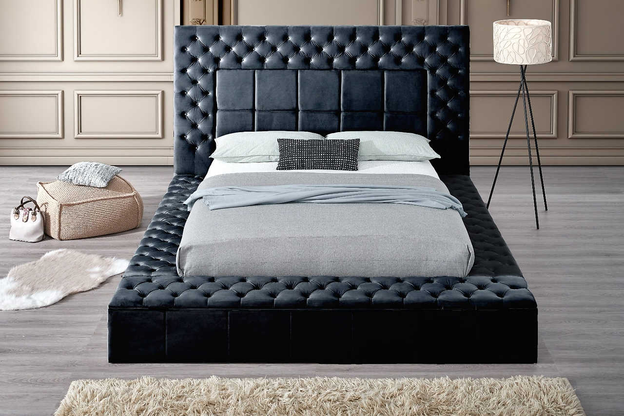 Side view showing storage compartments in footboard and rails
