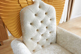 Side view of Lucifur fabric accent chair showing gold armrest accents