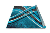 Turquoise area rug detail with shadow