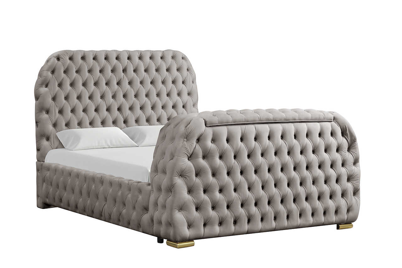 Bedroom with TV mounted on bed footboard