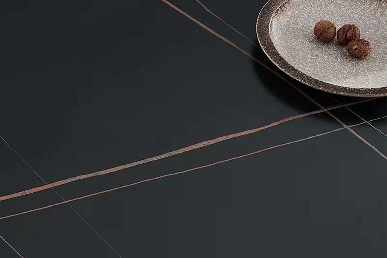 View of Lexi dining table edge and base design detail