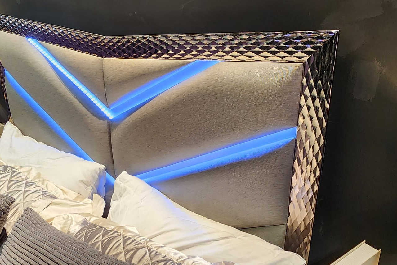 side view of Vera Gray Upholstered LED Platform Bedroom Set bed