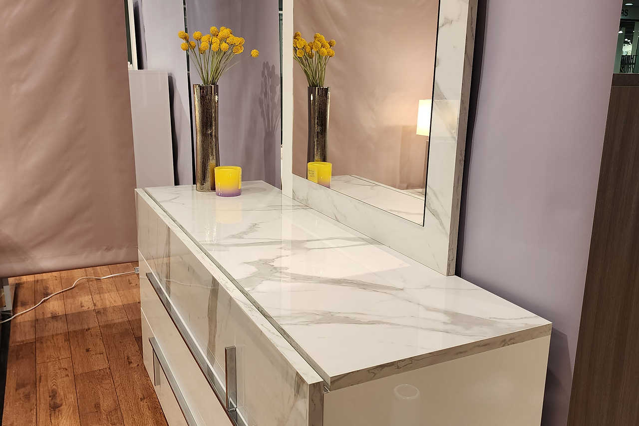 Nightstand drawer front with sleek hardware