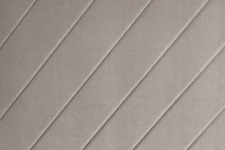 Close-up of gray velvet upholstery on Mio panel bed
